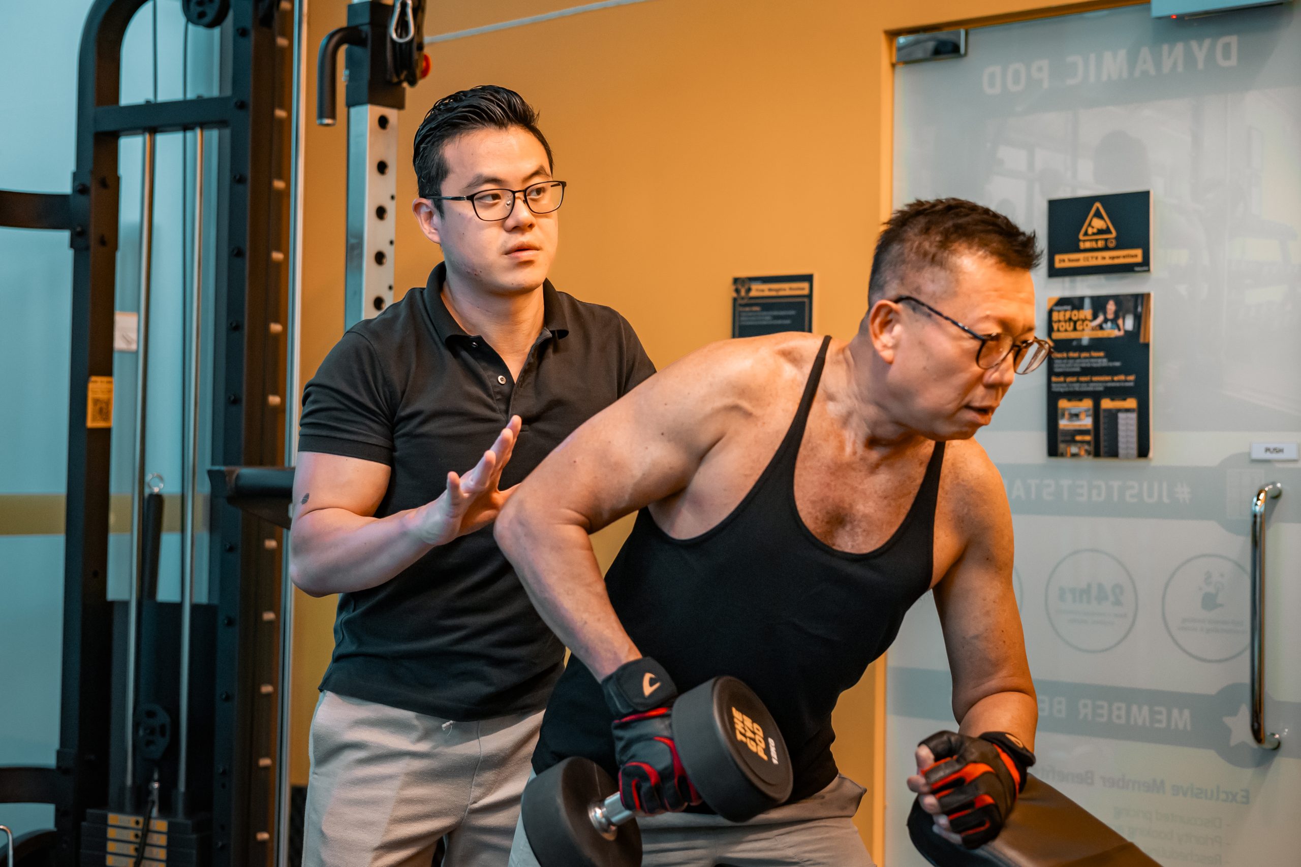 a senior being guided in personal training